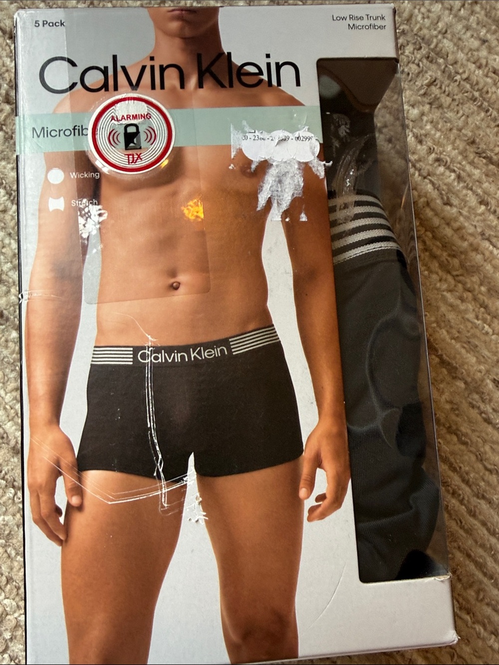 Calvin Klein Black Low-Rise Trunks (4) with Striped Waistband.